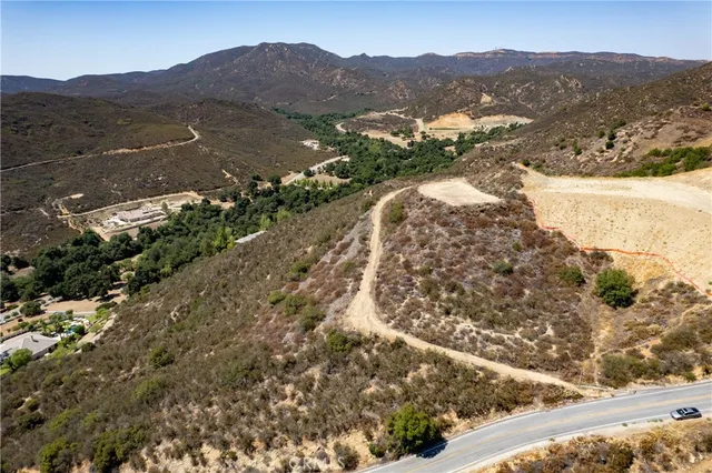 a view of a city with mountains in the background