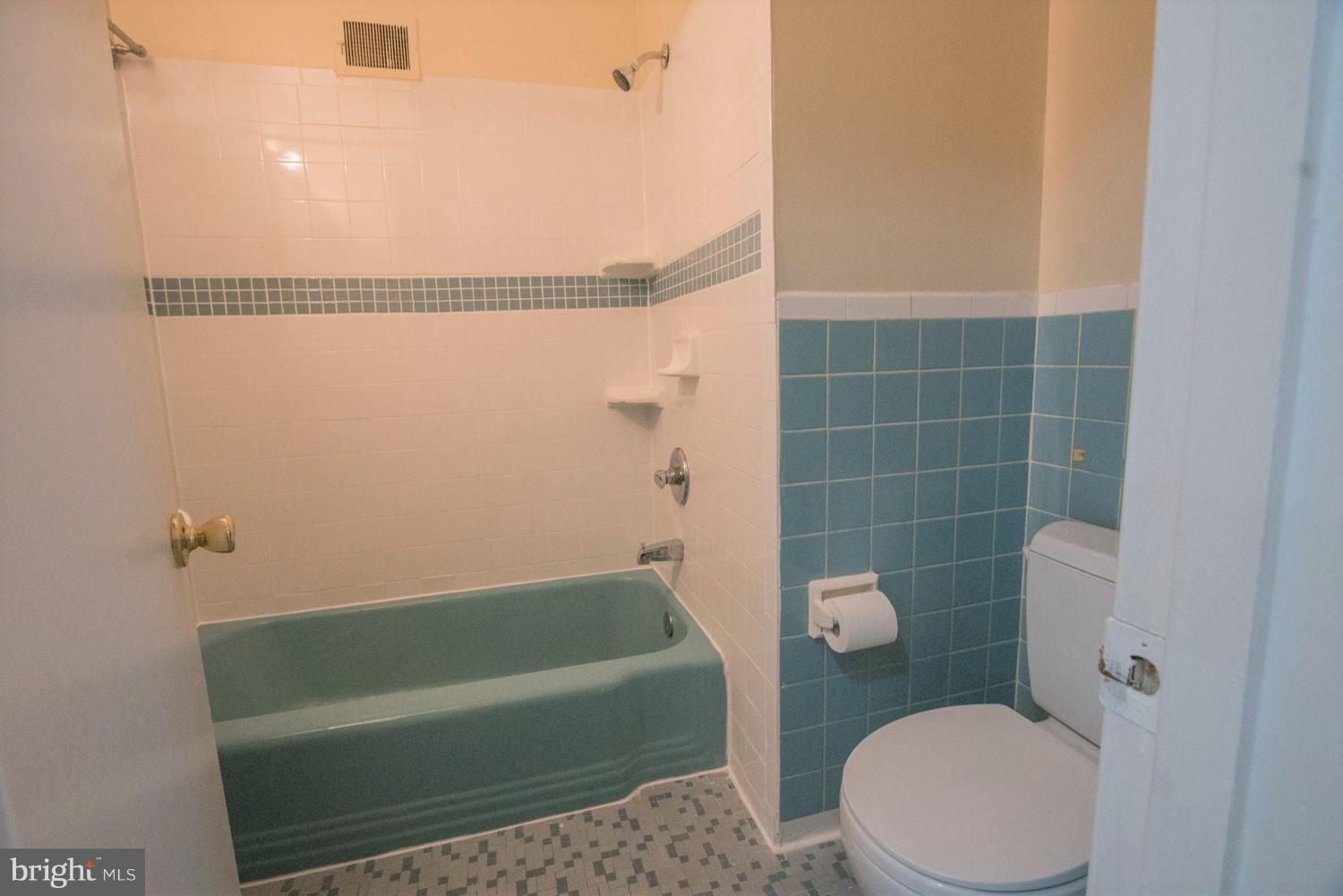 3930 Joliet Street Silver Spring, MD 20906 - Photo 12 of 28 a bathroom with a toilet and a bathtub