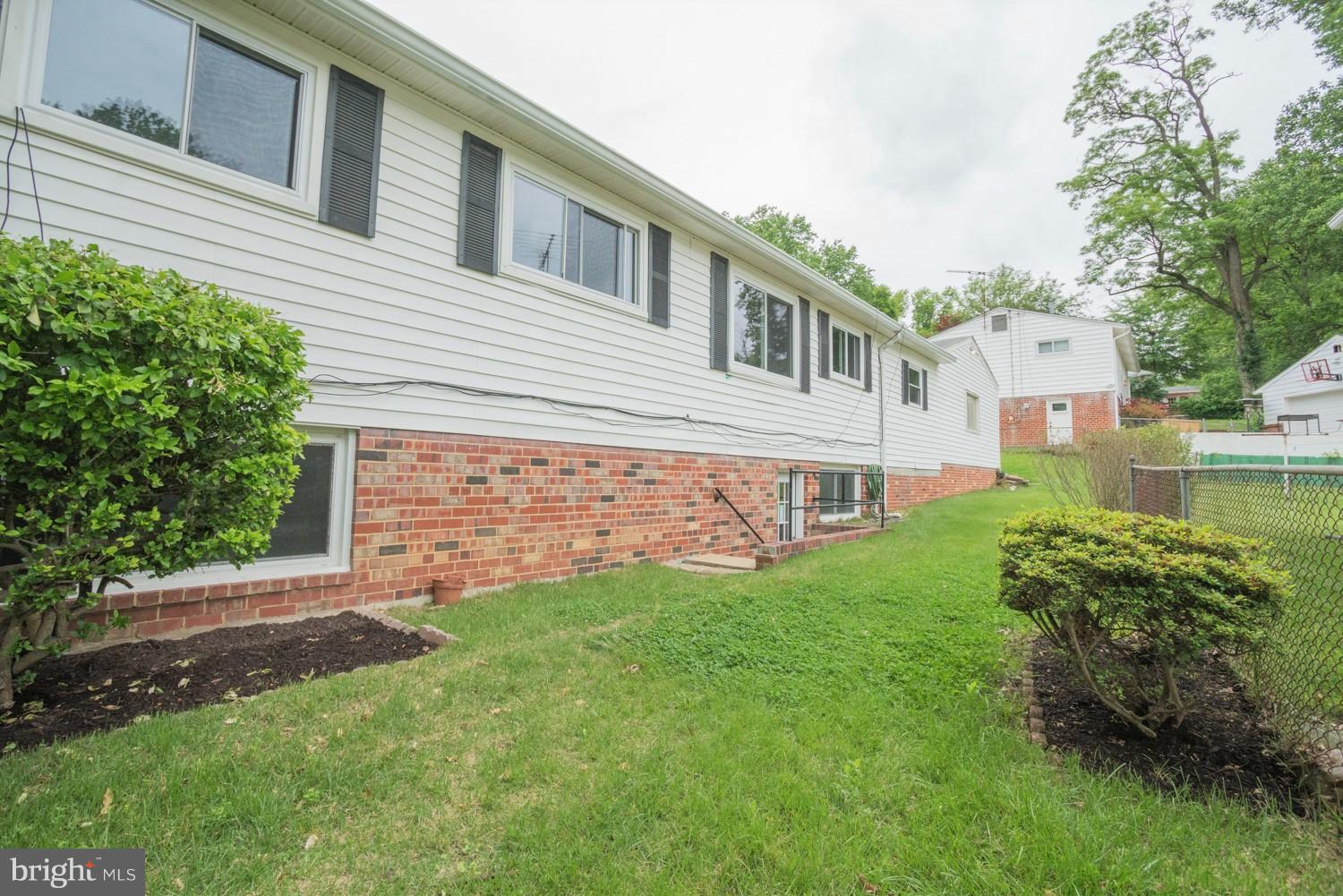 3930 Joliet Street Silver Spring, MD 20906 - Photo 28 of 28 a front view of a house with a yard