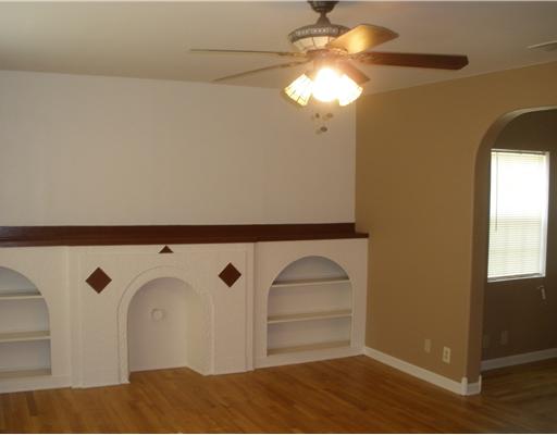 1810 3rd Street Corpus Christi, TX 78404 - Photo 4 of 10 a view of a livingroom with a chandelier fan