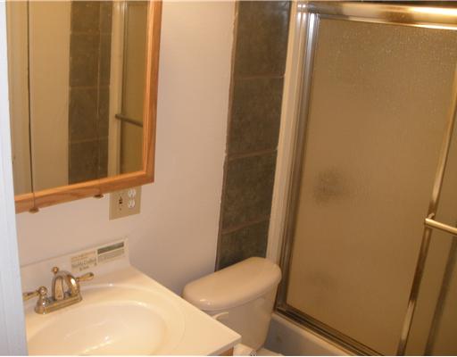 1810 3rd Street Corpus Christi, TX 78404 - Photo 8 of 10 a bathroom with a sink and a mirror