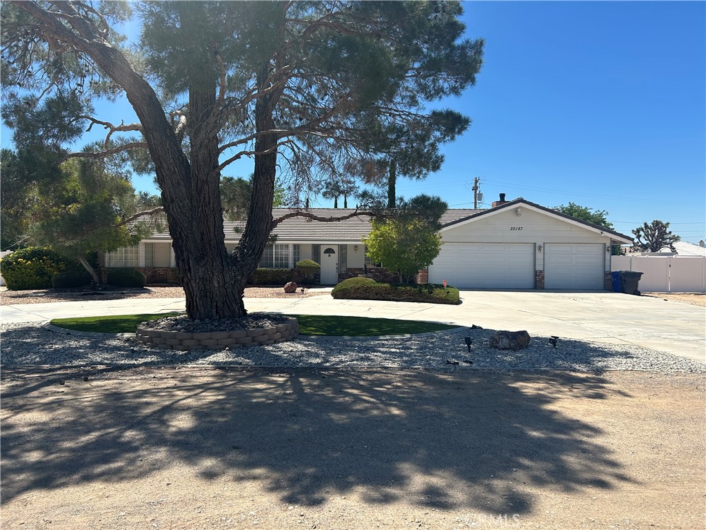 20187 Itasca Road Apple Valley, CA 92308 - Photo 2 of 35 a view of a house with a yard