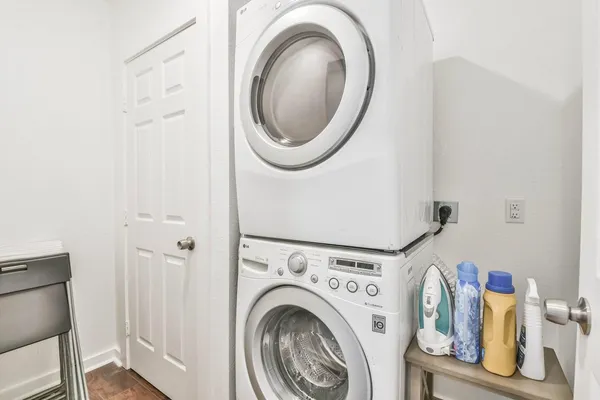 a utility room with dryer and washer