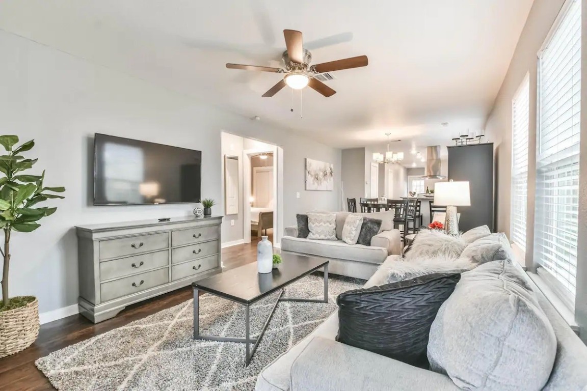 1212 Hamblen Street Houston, TX 77009 - Photo 2 of 13 a living room with furniture and a flat screen tv