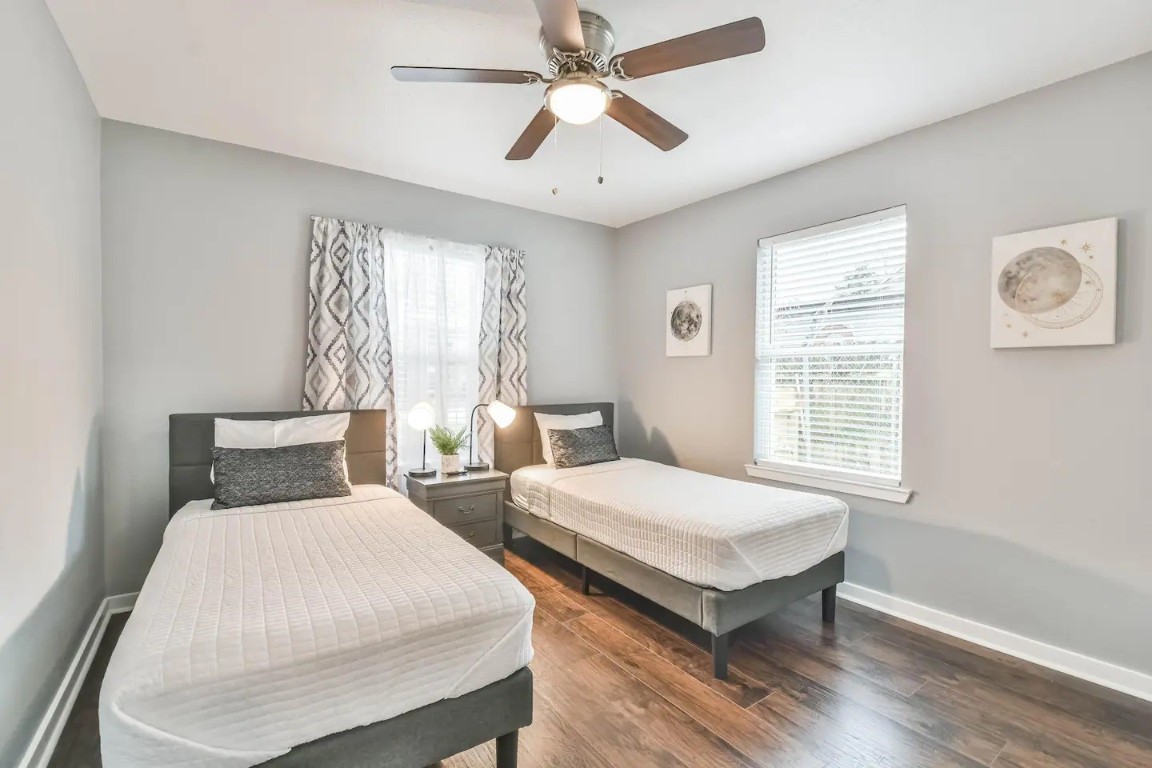1212 Hamblen Street Houston, TX 77009 - Photo 6 of 13 a bedroom with two beds and a window