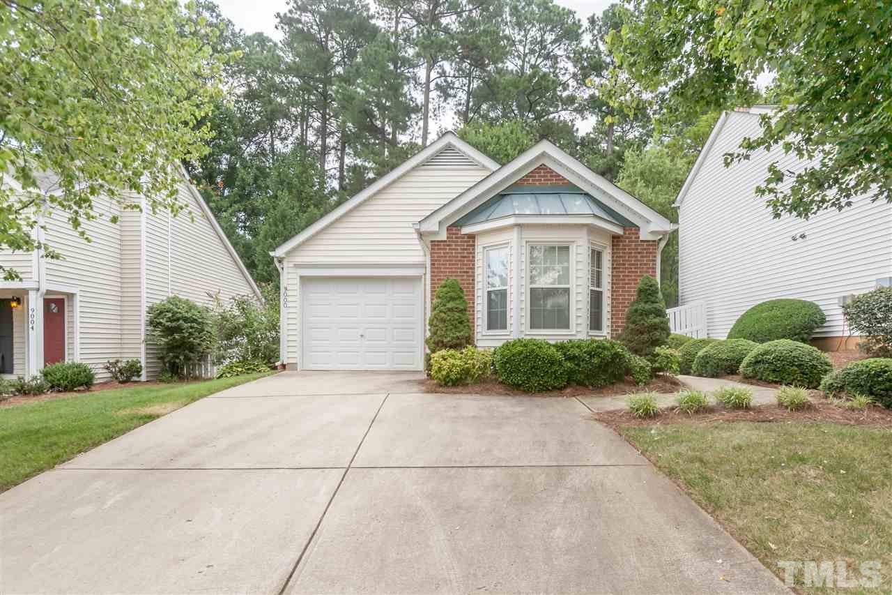9000 Shallcross Way Raleigh, NC 27617 - Photo 24 of 25 a view of a house with a yard and large trees