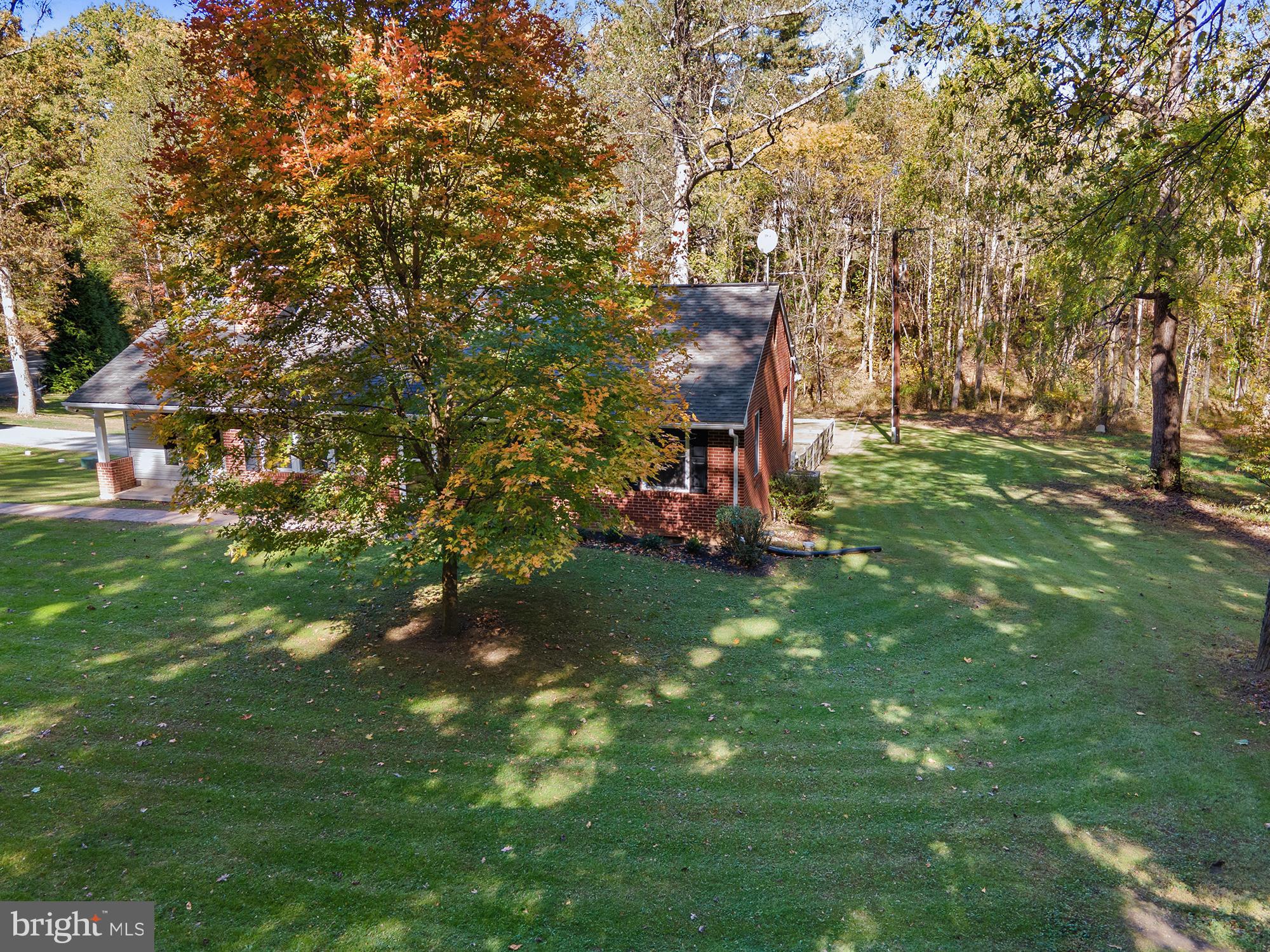4010 Greenmount Church Road Hampstead, MD 21074 - Photo 2 of 32 a view of a chairs in a backyard