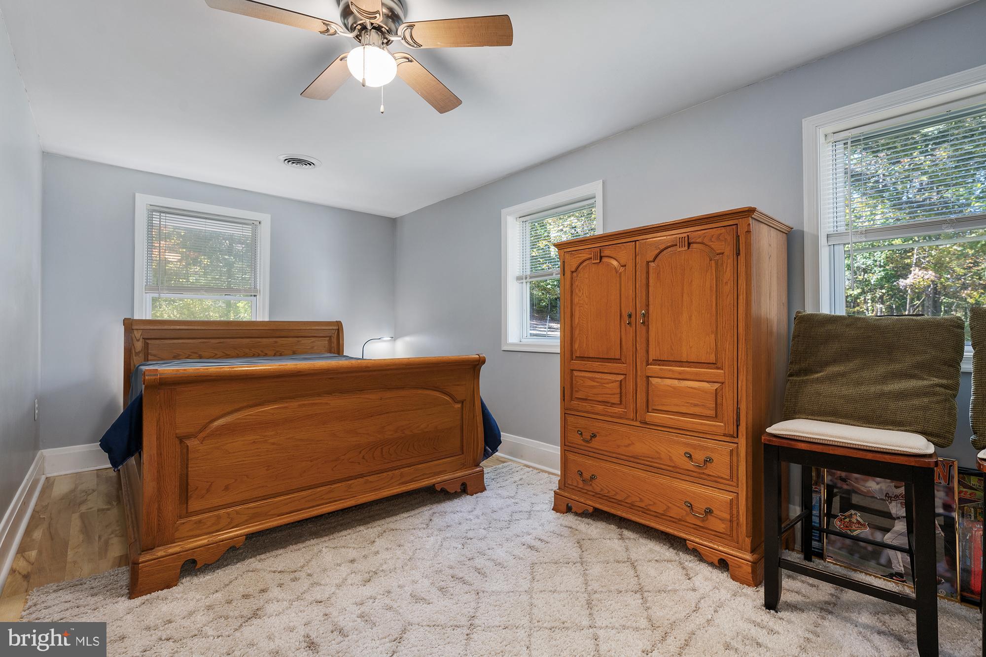 4010 Greenmount Church Road Hampstead, MD 21074 - Photo 24 of 32 a bedroom with a bed and a closet