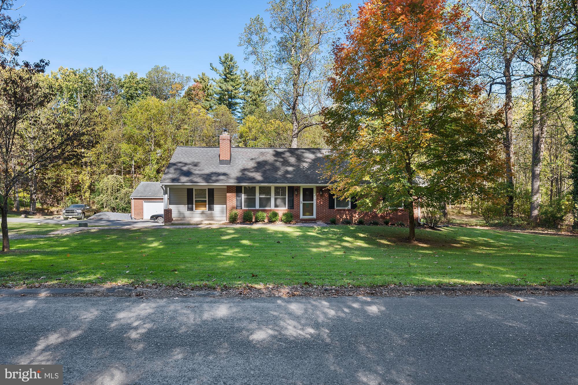 4010 Greenmount Church Road Hampstead, MD 21074 - Photo 32 of 32 a front view of a house with a garden