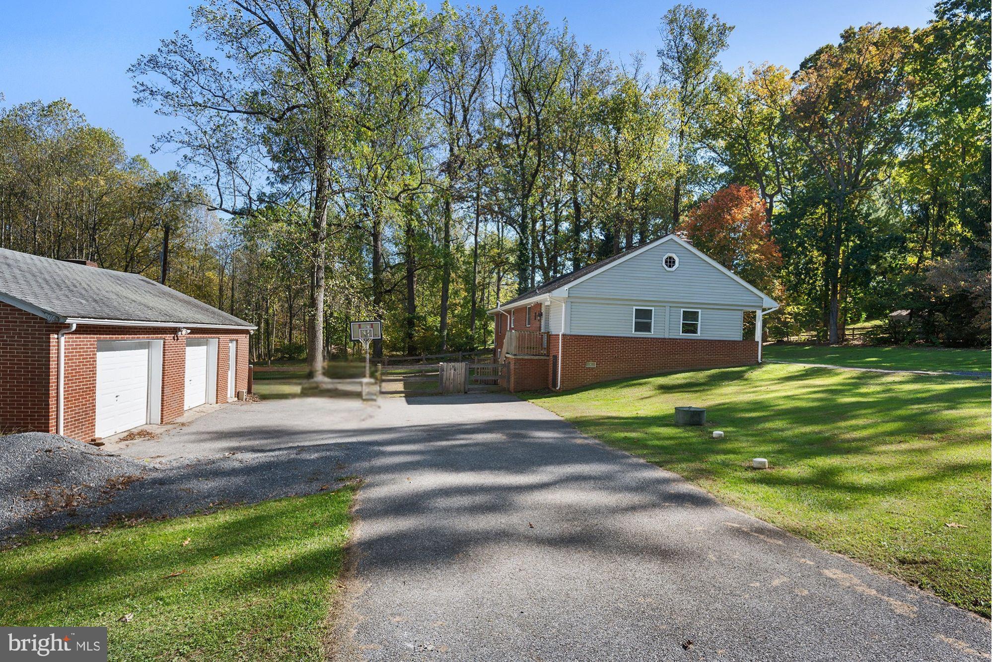 4010 Greenmount Church Road Hampstead, MD 21074 - Photo 4 of 32 a front view of house with yard and green space