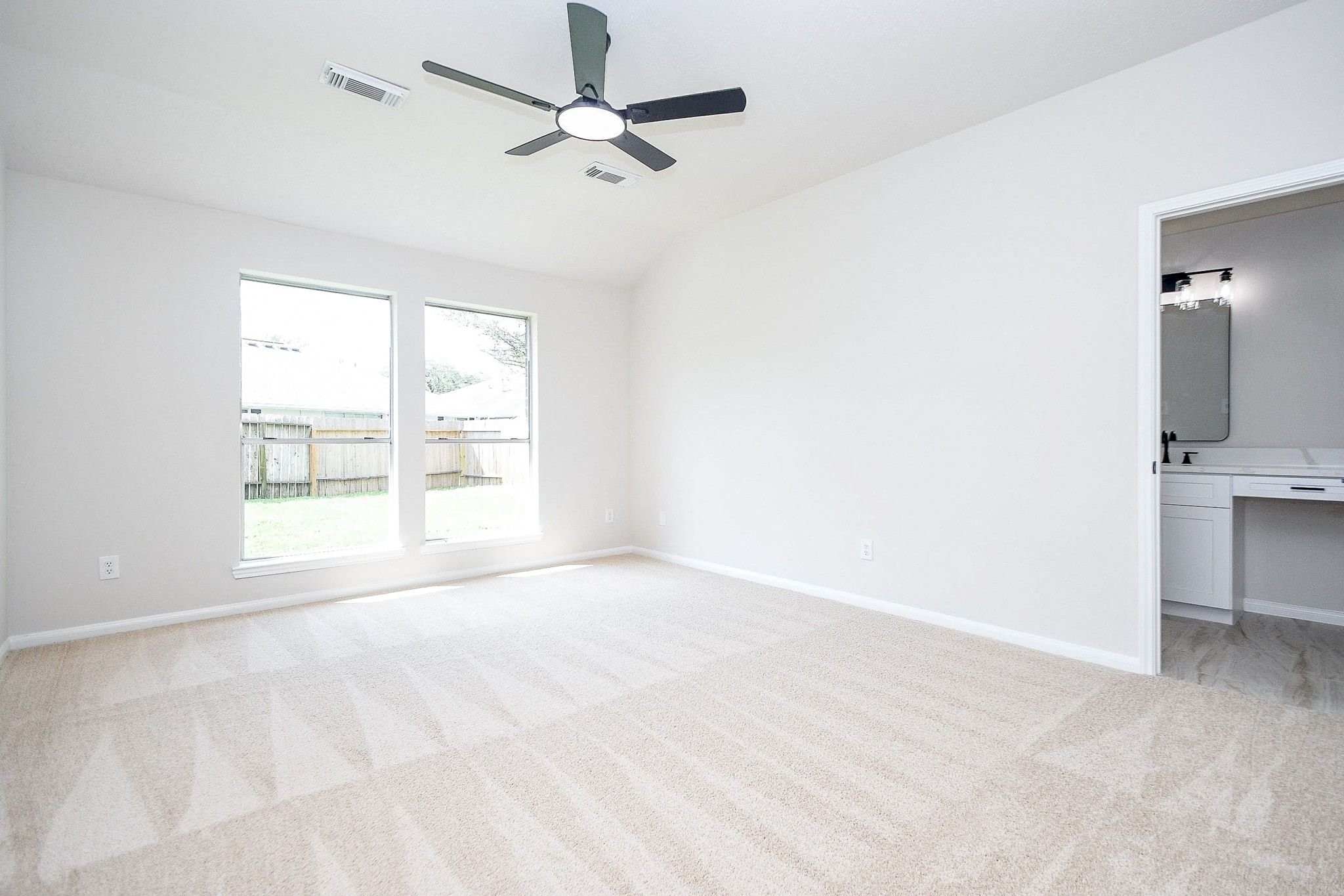 1422 Township Court Rosenberg, TX 77471 - Photo 26 of 32 a view of an empty room with a window
