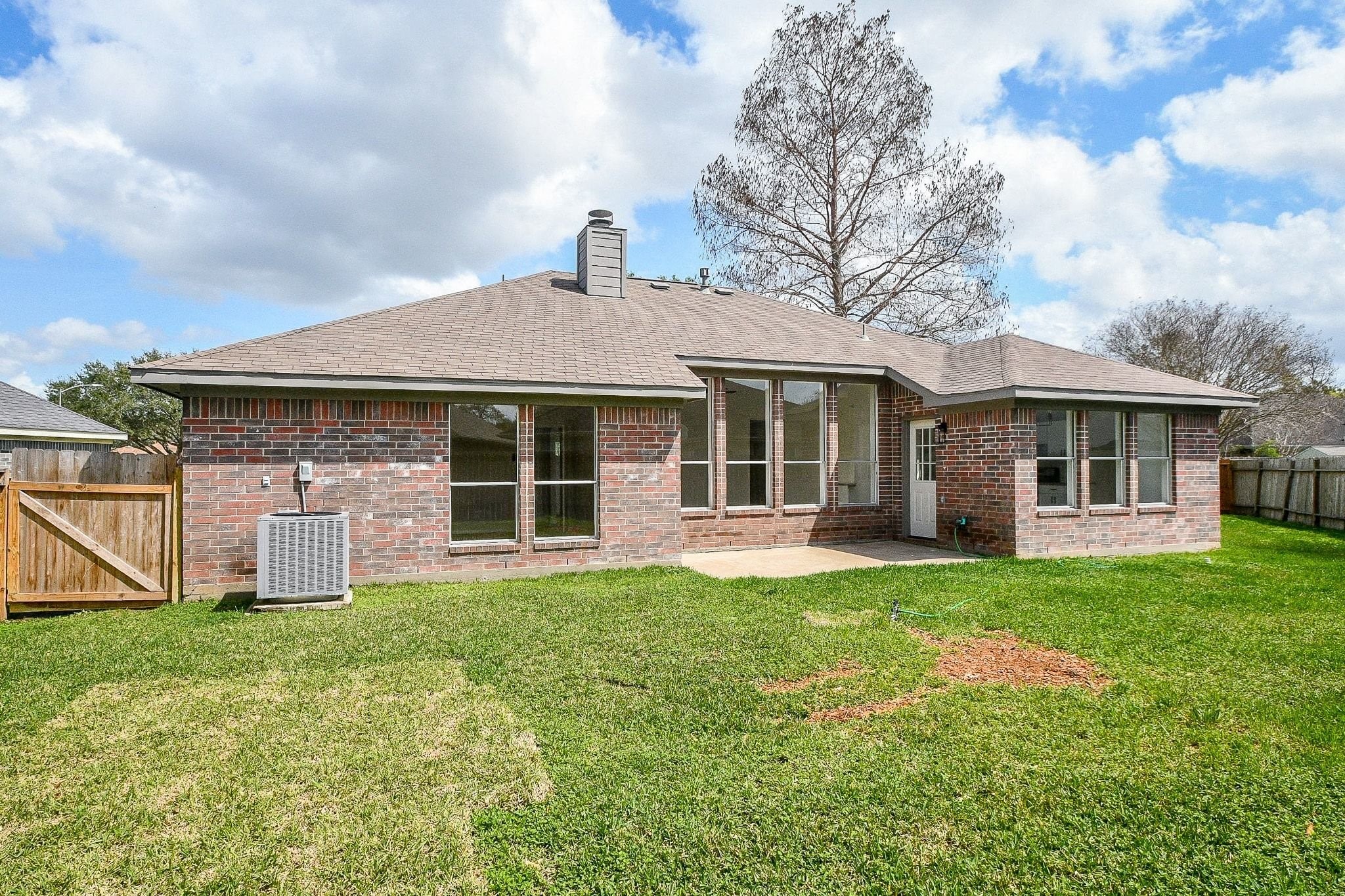 1422 Township Court Rosenberg, TX 77471 - Photo 32 of 32 a front view of a house with a yard and porch