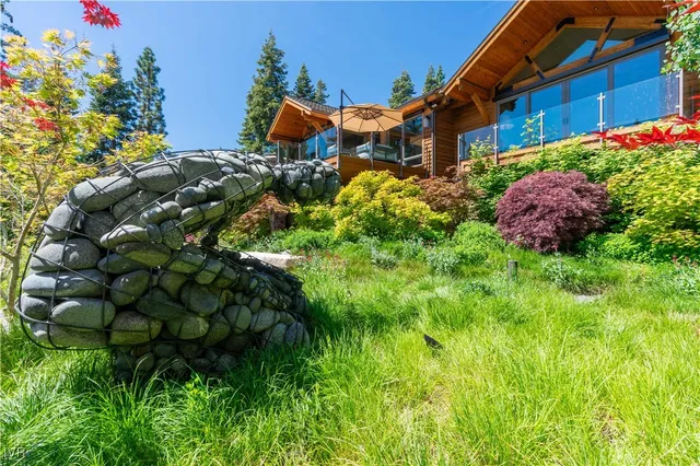 a backyard of a house with lots of green space
