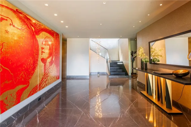 a view of hallway with furniture