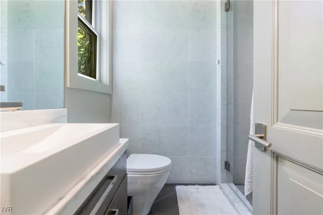 a kitchen that has a sink and a stove