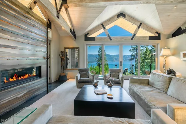 a view of a bench in the porch next to a yard