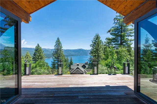 a view of a balcony with wooden floor