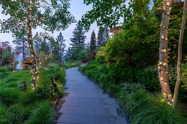 a backyard of a house with lots of green space