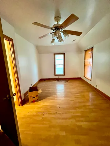 a view of an empty room and window