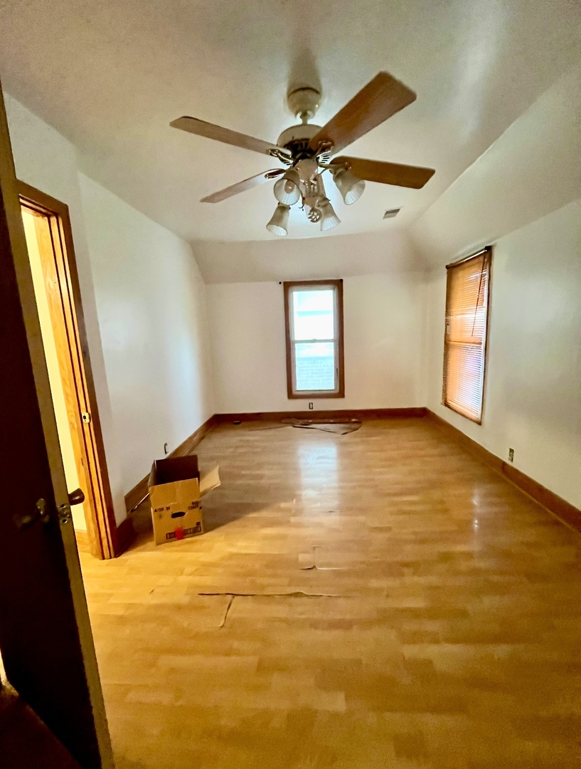 19 South Waller Avenue Chicago, IL 60644 - Photo 13 of 16 a view of an empty room and window