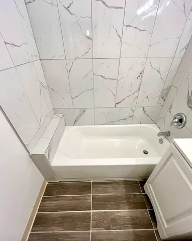 a bathroom with a bathtub