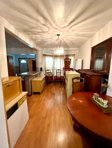 a living room with fireplace furniture and a flat screen tv