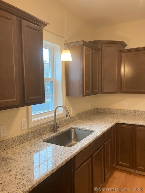 137 Webster Lane, Unit 242 Middletown, CT 06457 - Photo 6 of 17 a kitchen with a sink and cabinets