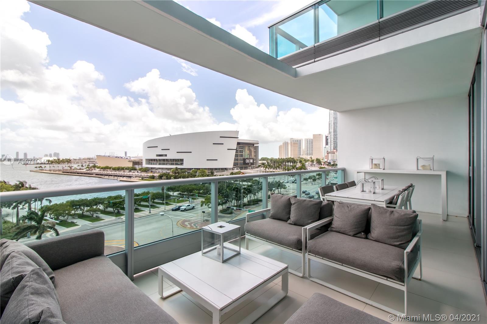 900 Biscayne Boulevard, Unit 705 Miami, FL 33132 - Photo 14 of 43 a balcony with furniture and a view of city from balcony