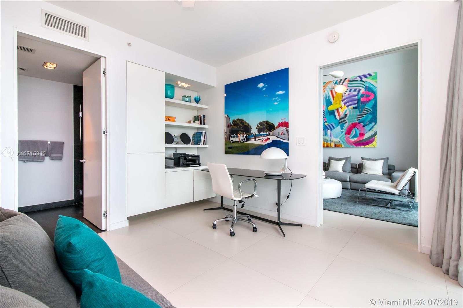 900 Biscayne Boulevard, Unit 705 Miami, FL 33132 - Photo 18 of 43 a workspace with furniture and window