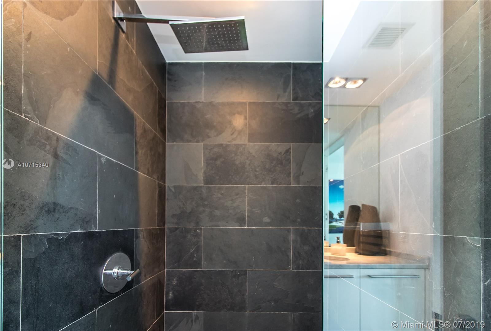 900 Biscayne Boulevard, Unit 705 Miami, FL 33132 - Photo 23 of 43 a bathroom with a shower