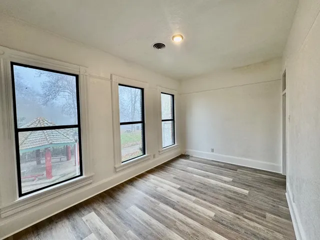 a house view with a sitting space and garden view