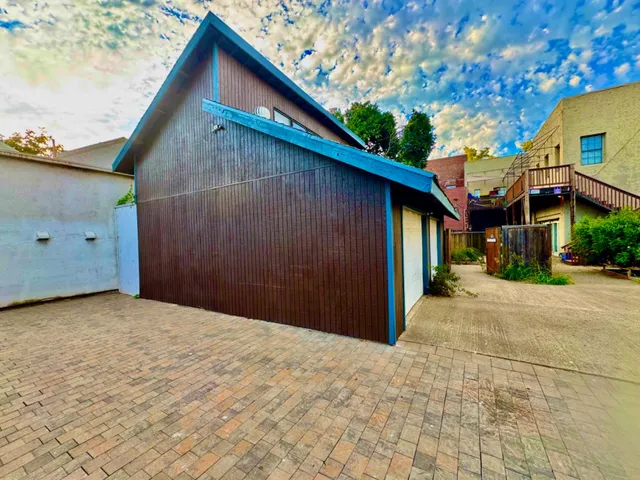 a view of swimming pool with a garden