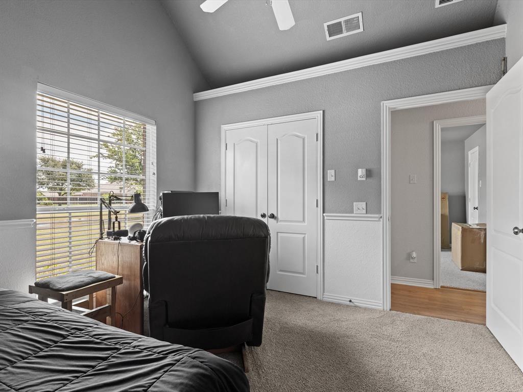 10066 Irish Ridge Forney, TX 75126 - Photo 26 of 39 Bedroom with carpet floors, a closet, high vaulted ceiling, and ceiling fan