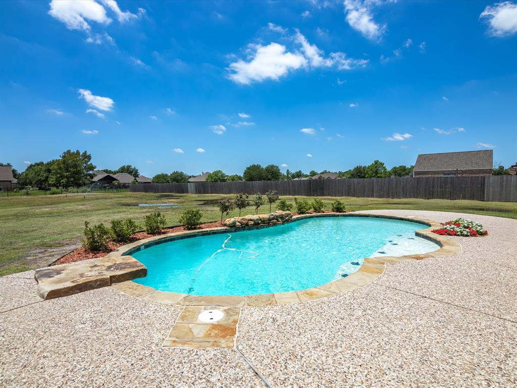 10066 Irish Ridge Forney, TX 75126 - Photo 32 of 39 View of swimming pool featuring a fenced backyard