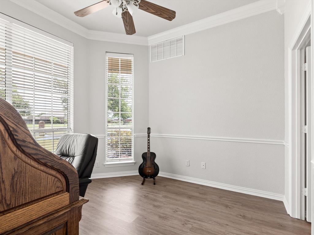 10066 Irish Ridge Forney, TX 75126 - Photo 8 of 39 Office space with ceiling fan, crown molding, and wood finished floors
