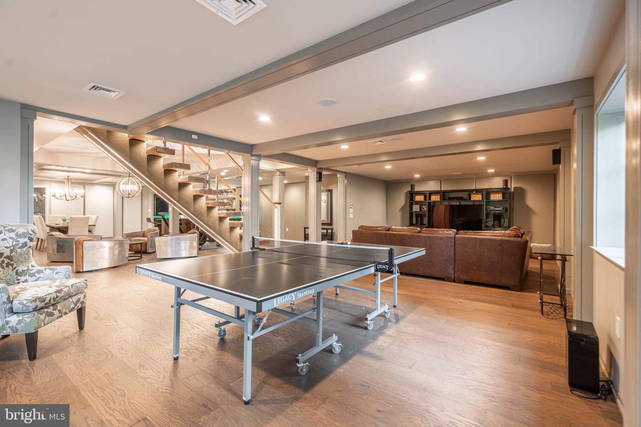 4104 Howell Road Malvern, PA 19355 - Photo 45 of 84 a room with lots of furniture and wooden floor