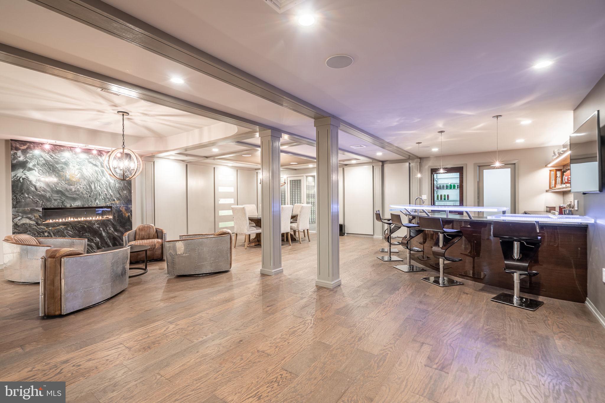 4104 Howell Road Malvern, PA 19355 - Photo 49 of 84 a living room with lots of furniture and a large window