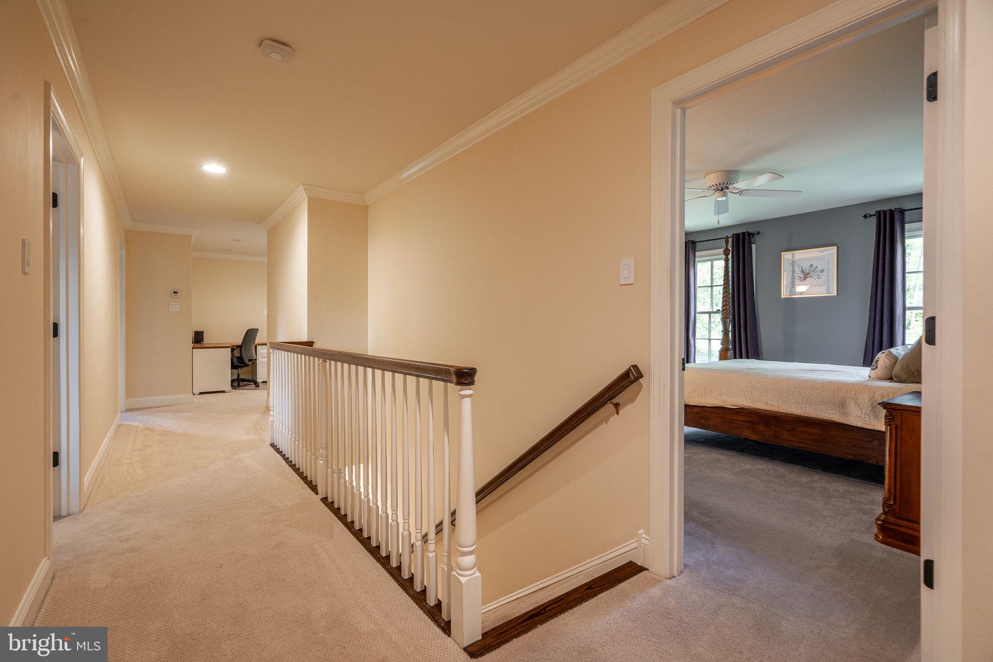 4104 Howell Road Malvern, PA 19355 - Photo 64 of 84 a view of a bedroom with wooden floor and a balcony