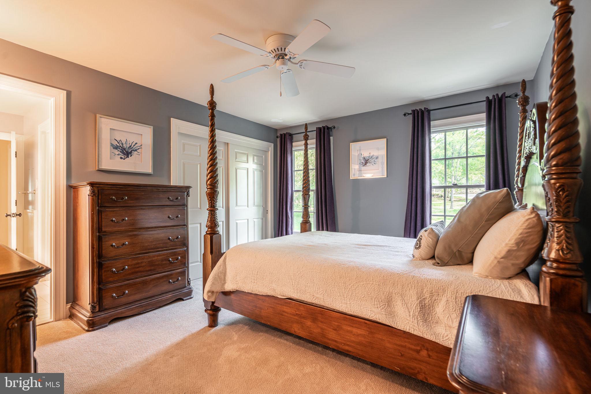 4104 Howell Road Malvern, PA 19355 - Photo 65 of 84 a bedroom with a bed a dresser and a window