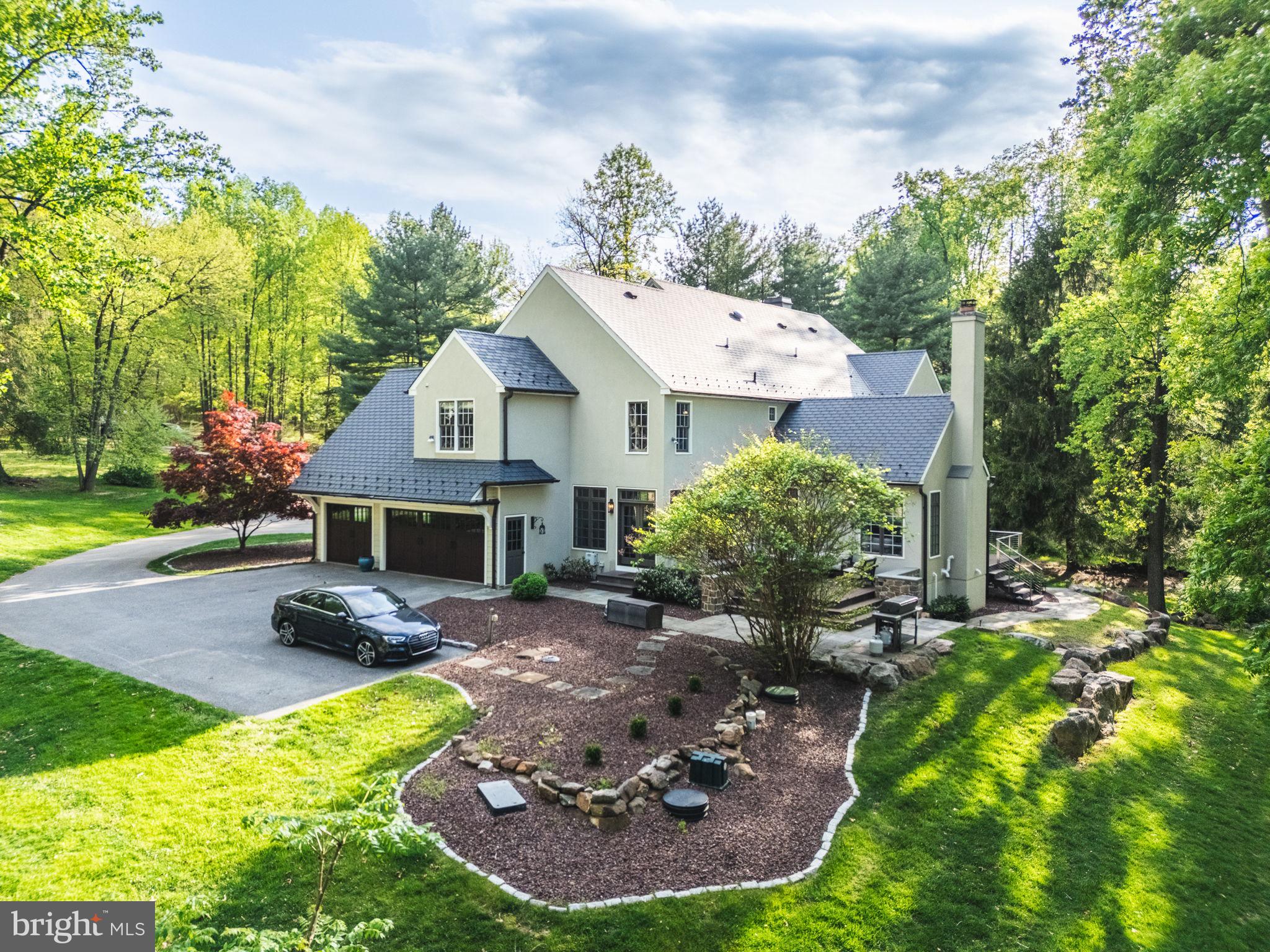4104 Howell Road Malvern, PA 19355 - Photo 80 of 84 a view of a house with backyard fire pit and outdoor