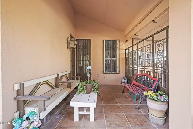 a view of a porch with furniture