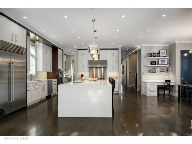 a living room with furniture large window and flat screen tv