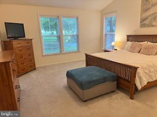 7792 Old Receiver Road Frederick, MD 21702 - Photo 13 of 51 a bedroom with a bed and flat screen tv