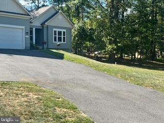7792 Old Receiver Road Frederick, MD 21702 - Photo 47 of 51 a front view of a house with yard and green space