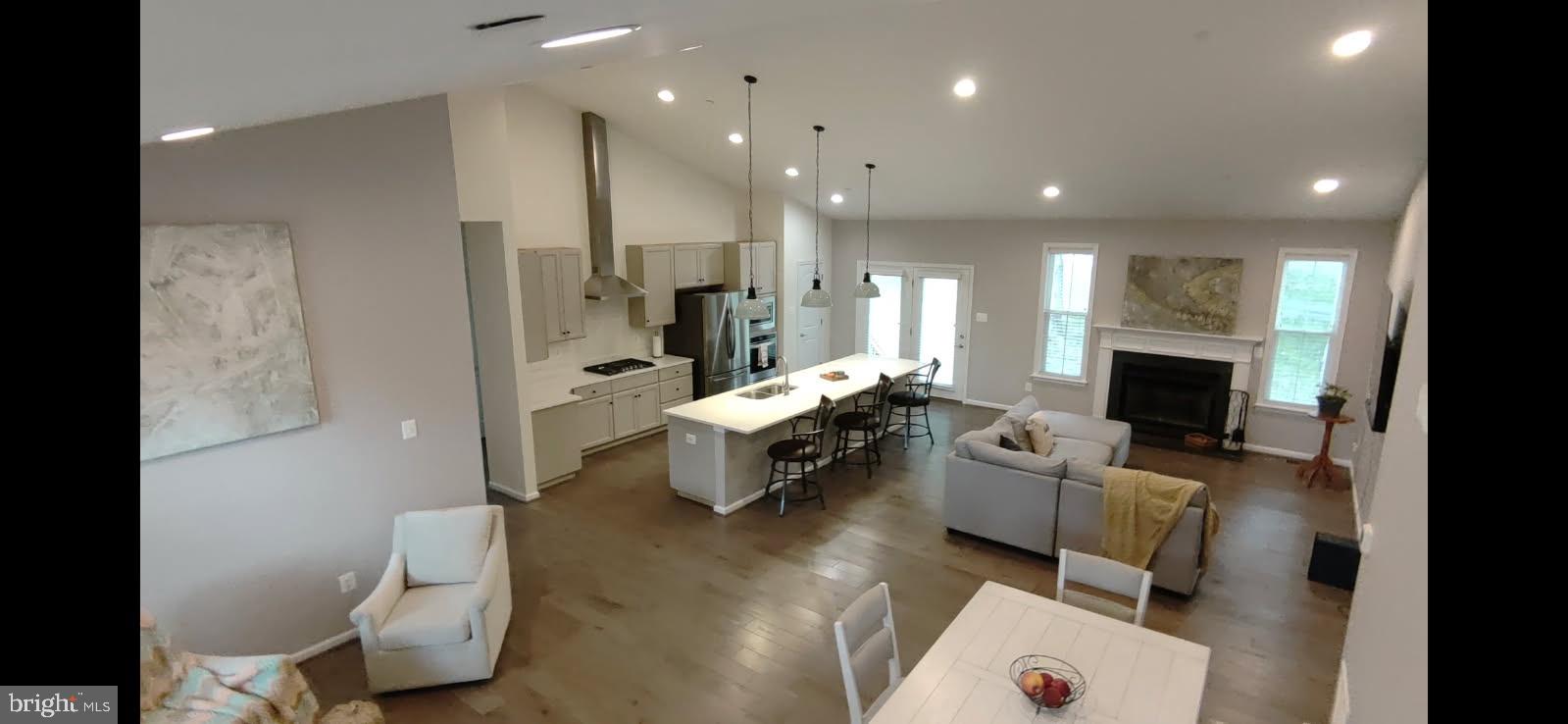 7792 Old Receiver Road Frederick, MD 21702 - Photo 6 of 51 a living room with furniture and a flat screen tv
