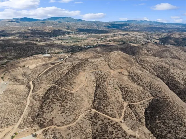 a view of mountain view with mountains in the background