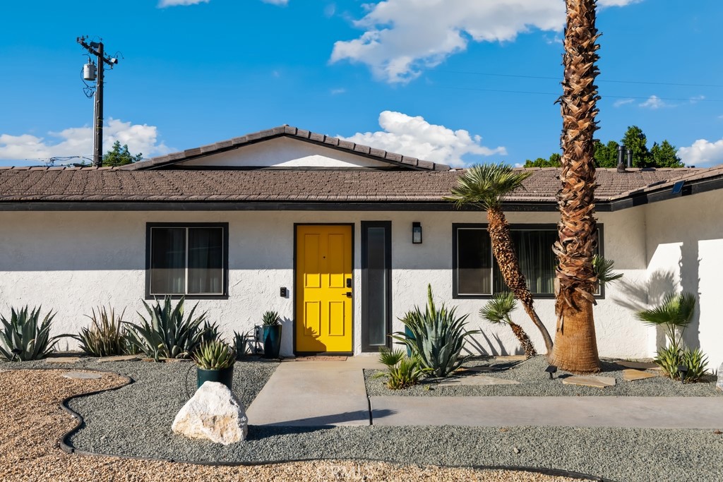 1980 East Rochelle Road Palm Springs, CA 92262 - Photo 48 of 60 a view of a house with a patio