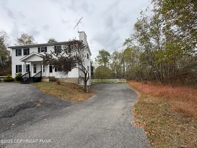 a view of a street with houses