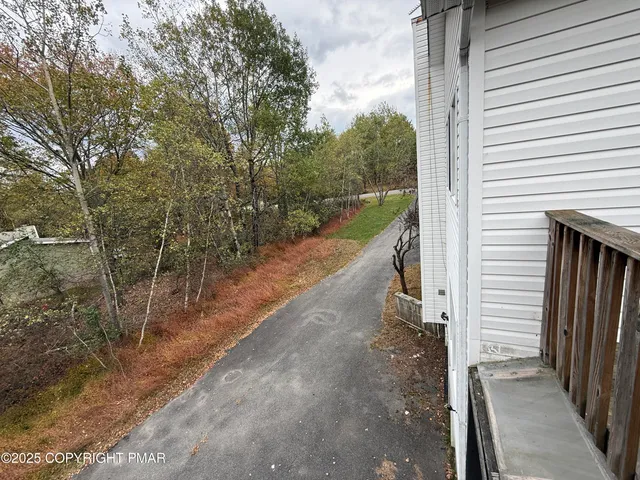 a view of a balcony with an outdoor space