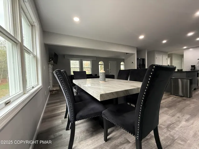 a view of a dining room with furniture